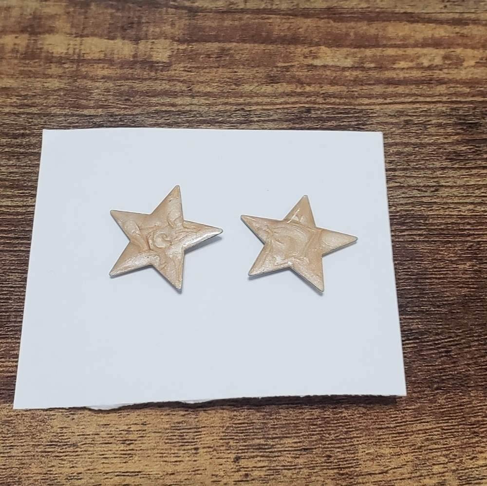 tan cream star statement earrings